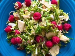 Shaved Brussels Sprout Salad with Fruit, Gorgonzola, and Brown Butter Walnuts (Recipe)