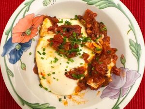 Eggs Poached in Buttery Tomatoes (Recipe)